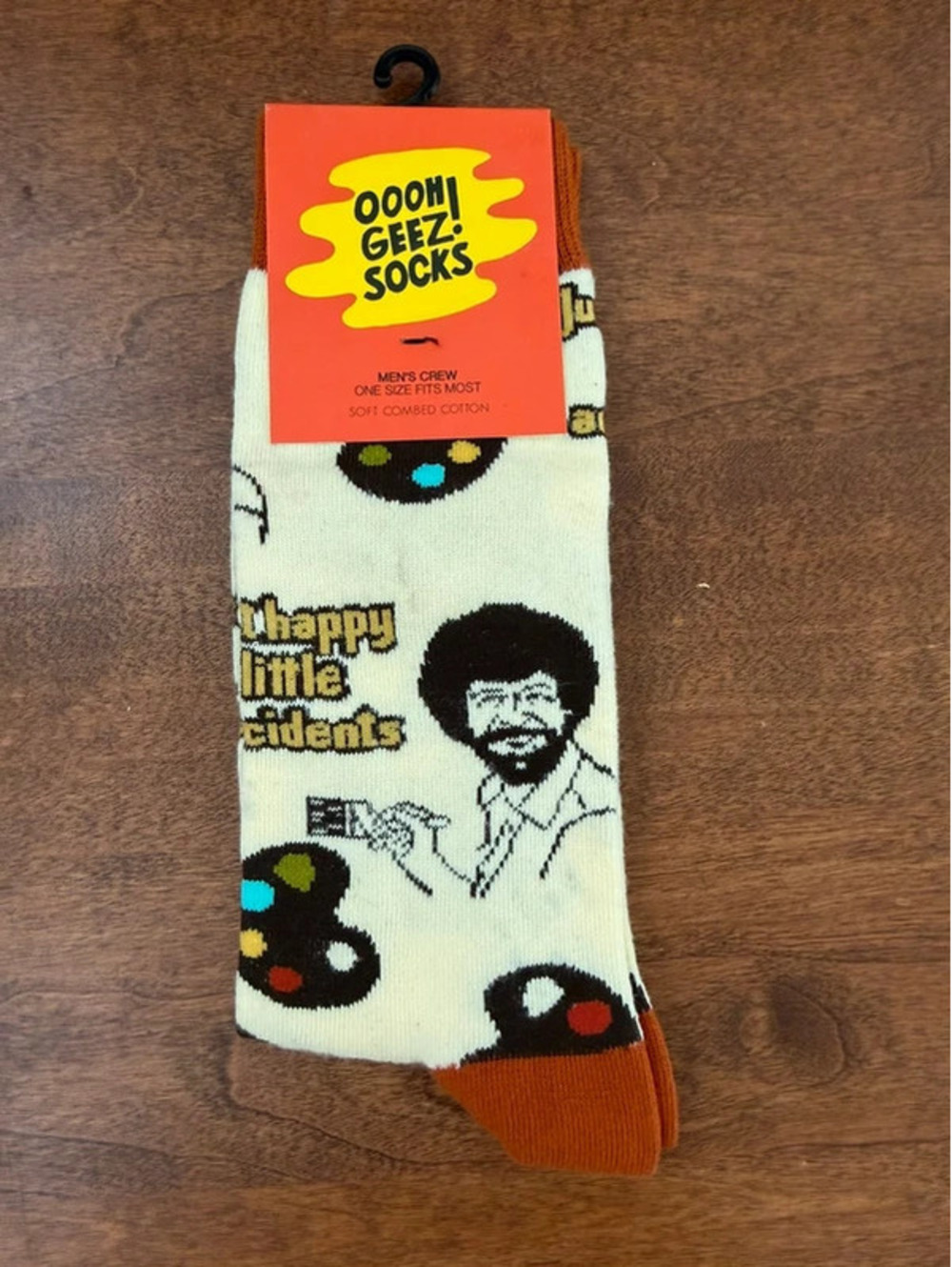 Oooh Yeah Socks feature a whimsical Bob Ross